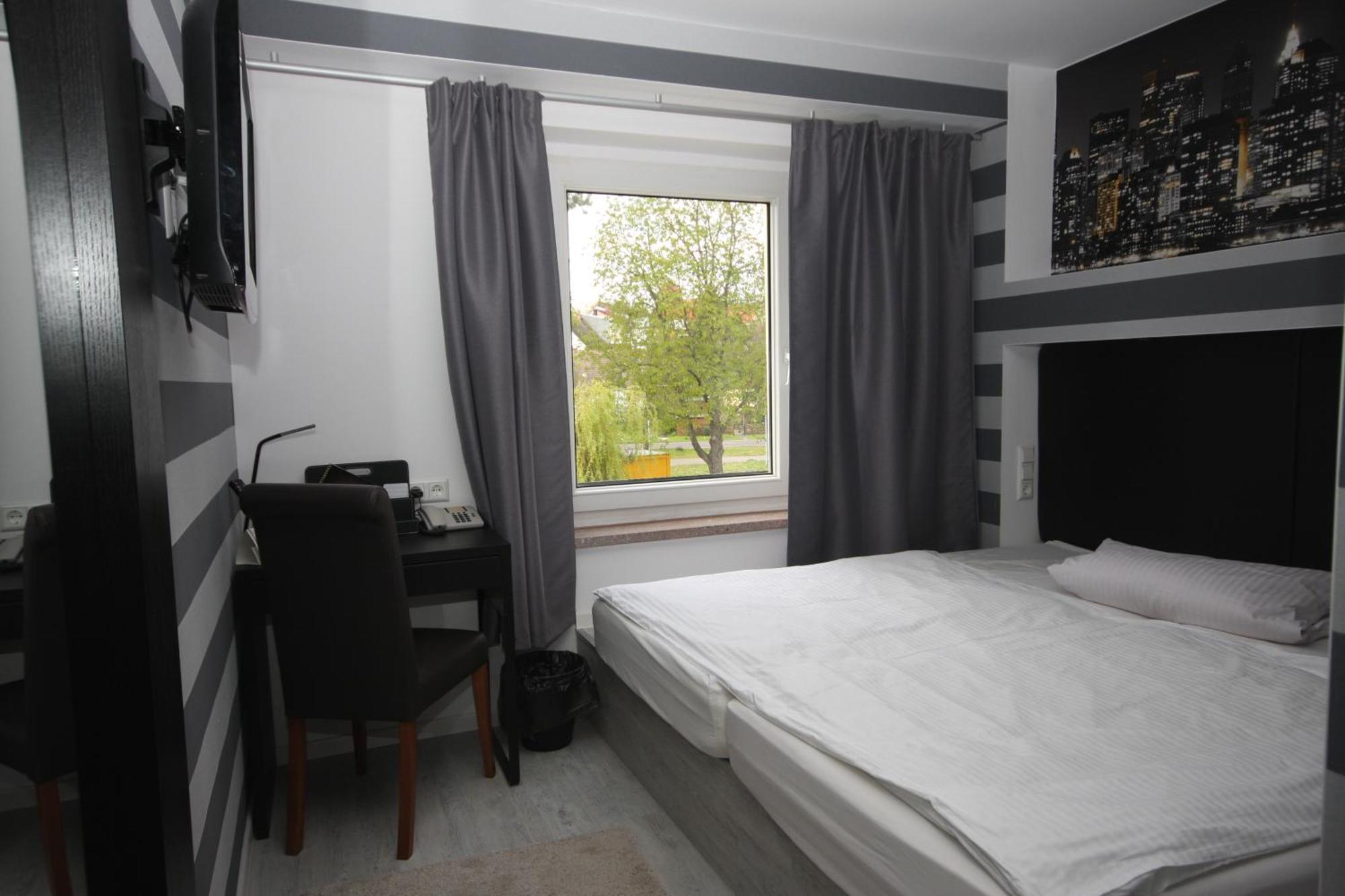 Sl'Otel Budget Bernburg Pokoj fotografie