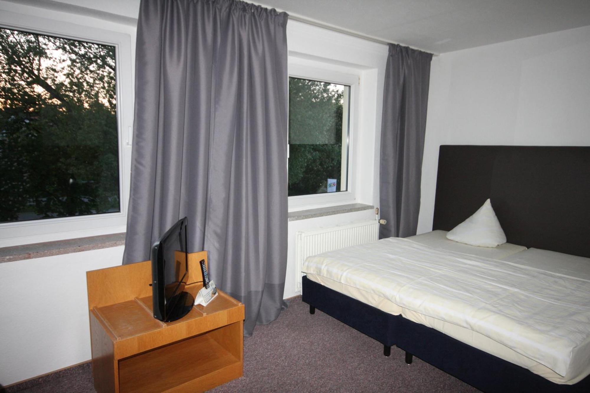 Sl'Otel Budget Bernburg Pokoj fotografie